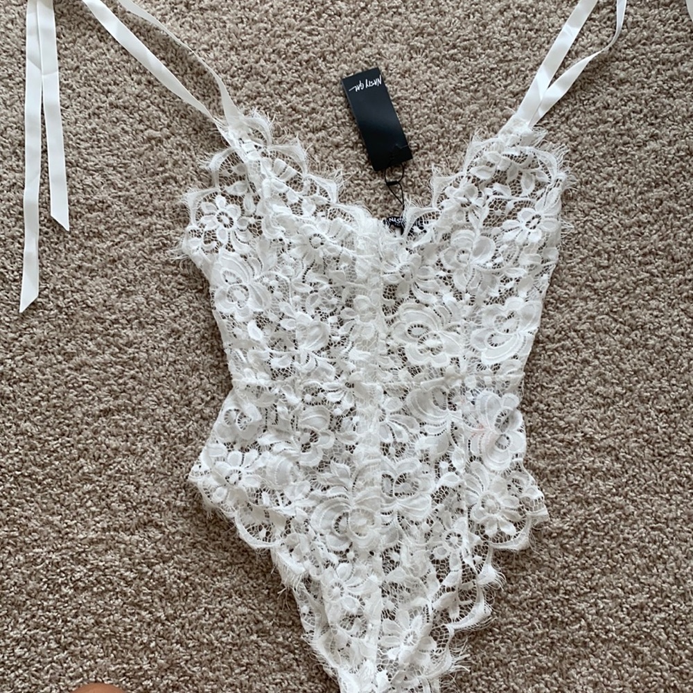 See- though white flower pattern bodysuit